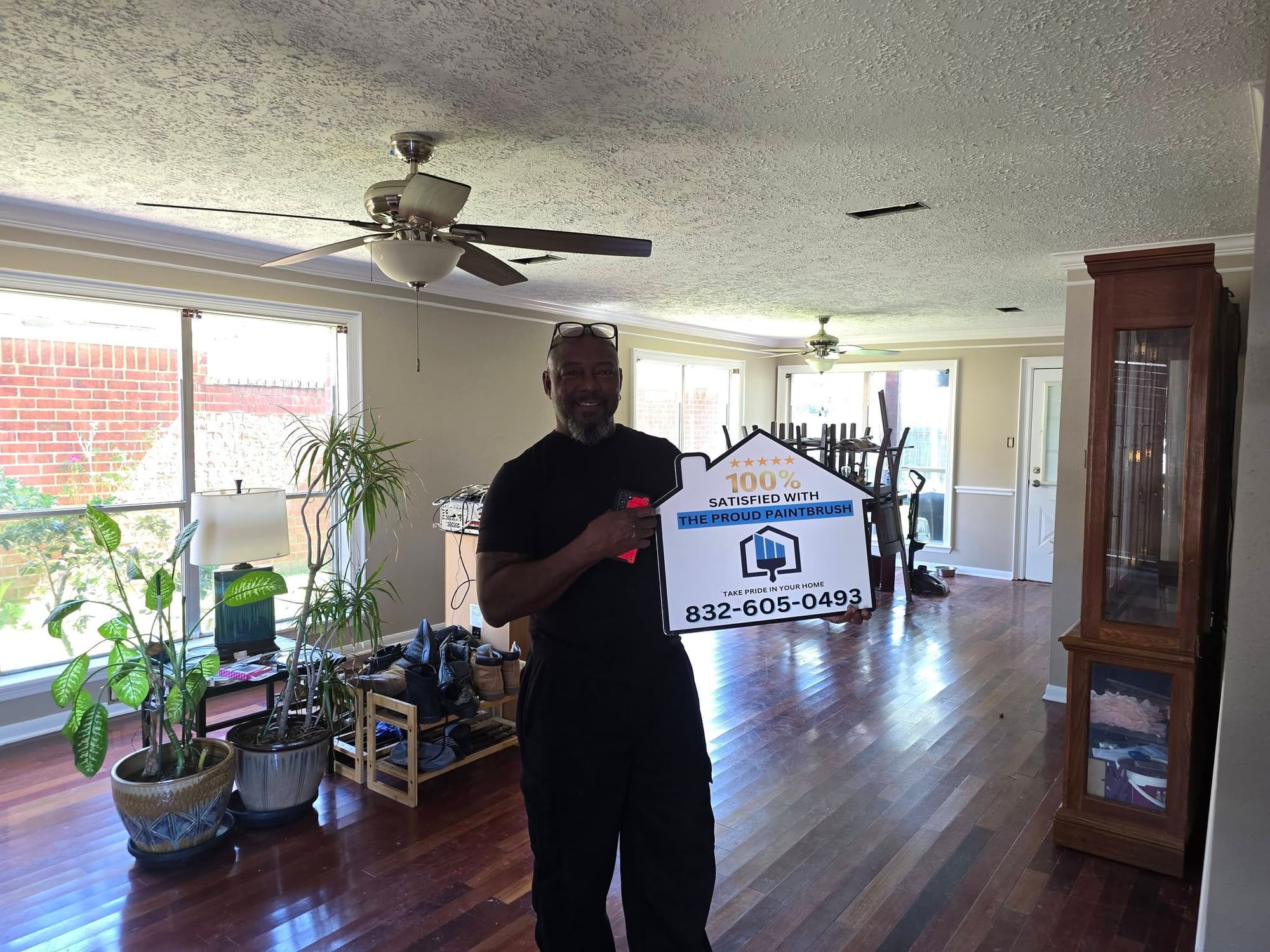 Happy customer after interior painting project in Sugar Land, TX