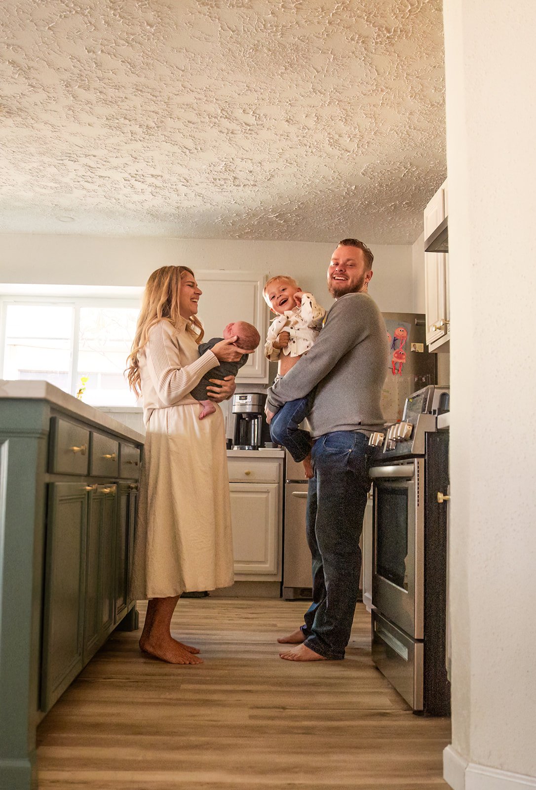 Chris Petkau, owner of The Proud Paintbrush, with his family