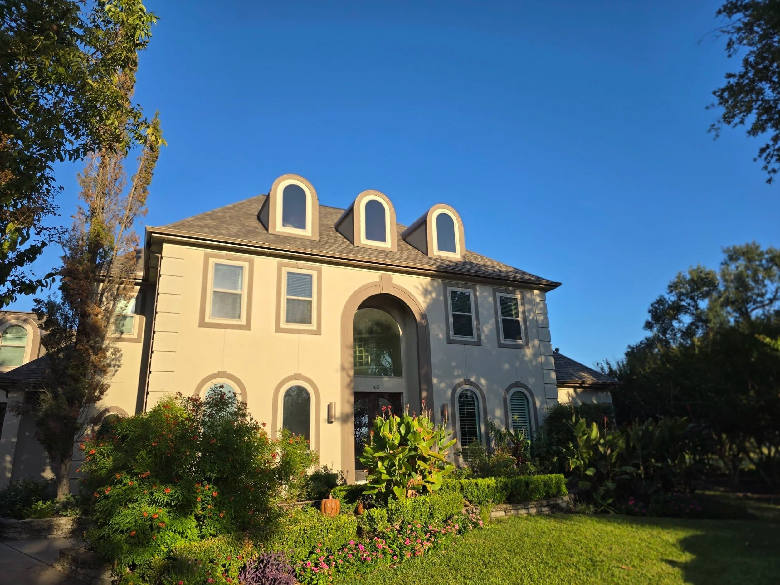 Happy West Houston TX homeowner after exterior repaint