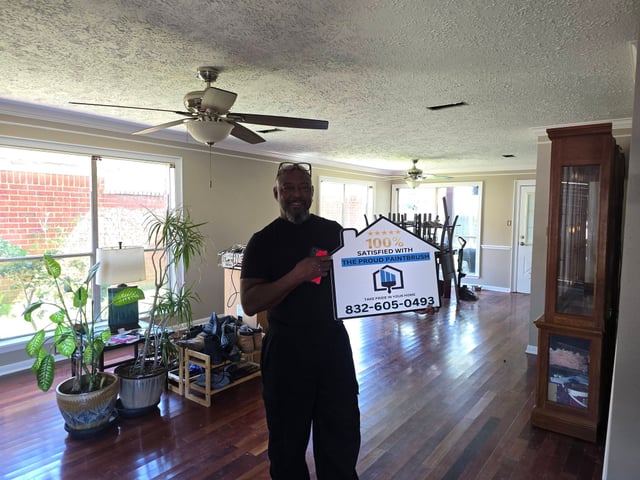 Happy customer after interior painting project in Sugar Land, TX