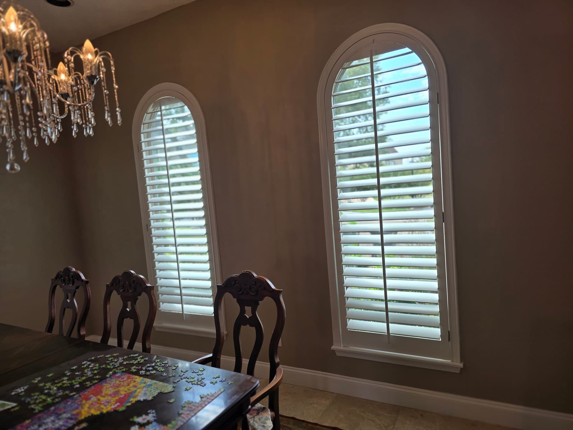 Dining room with taupe walls repainted in West Houston, TX by The Proud Paintbrush