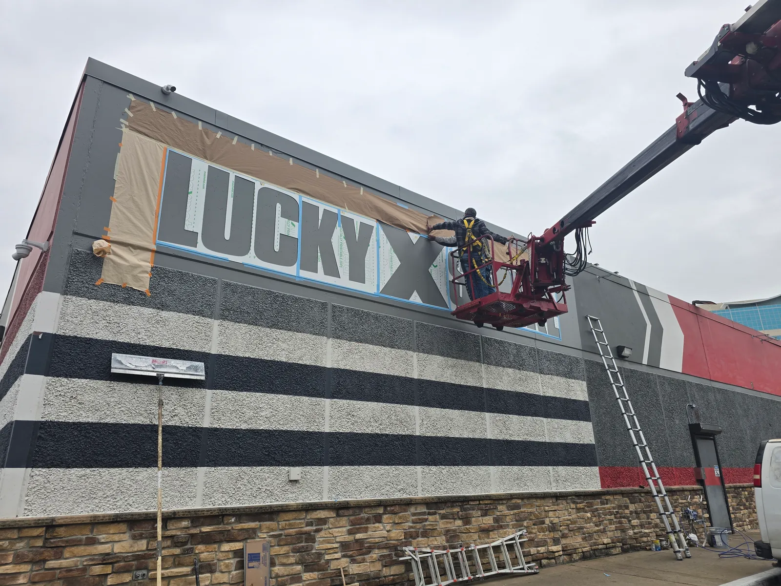 Commercial building facade repainted in Fort Bend County by The Proud Paintbrush