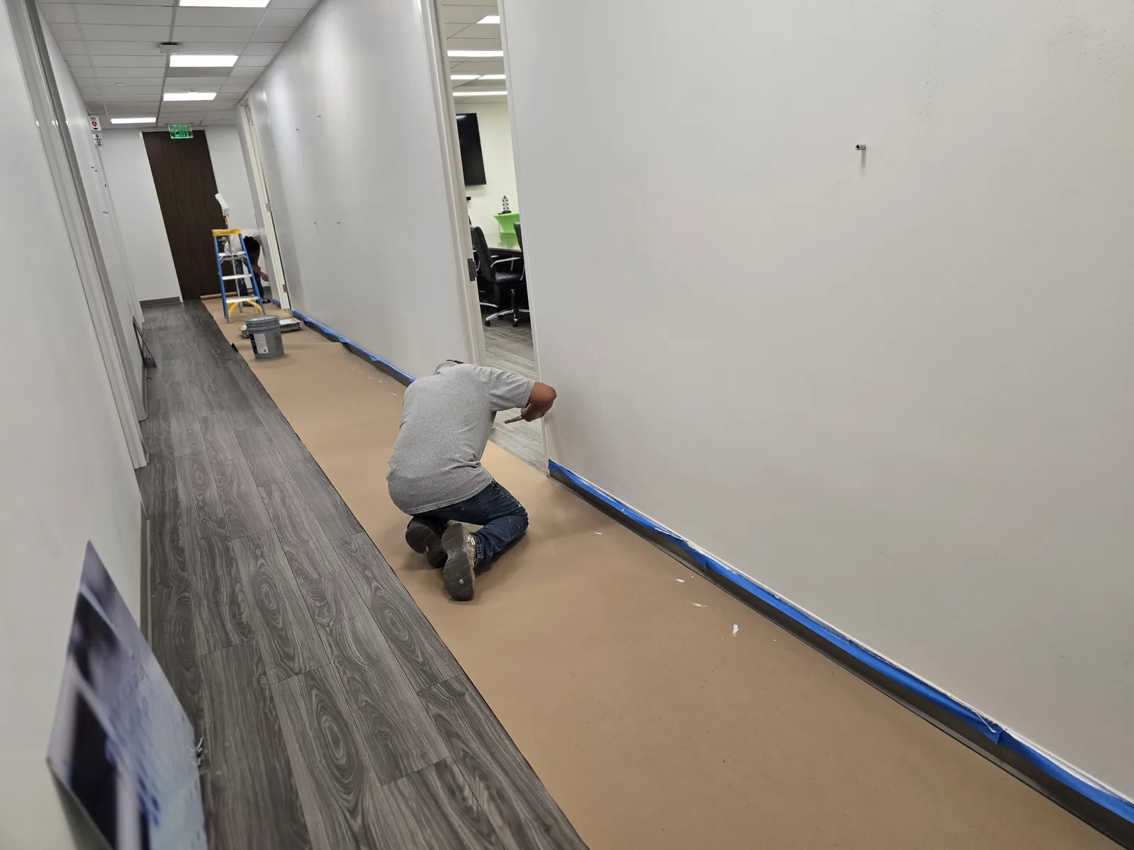 Commercial office corridor repainted in Sugar Land, TX by The Proud Paintbrush