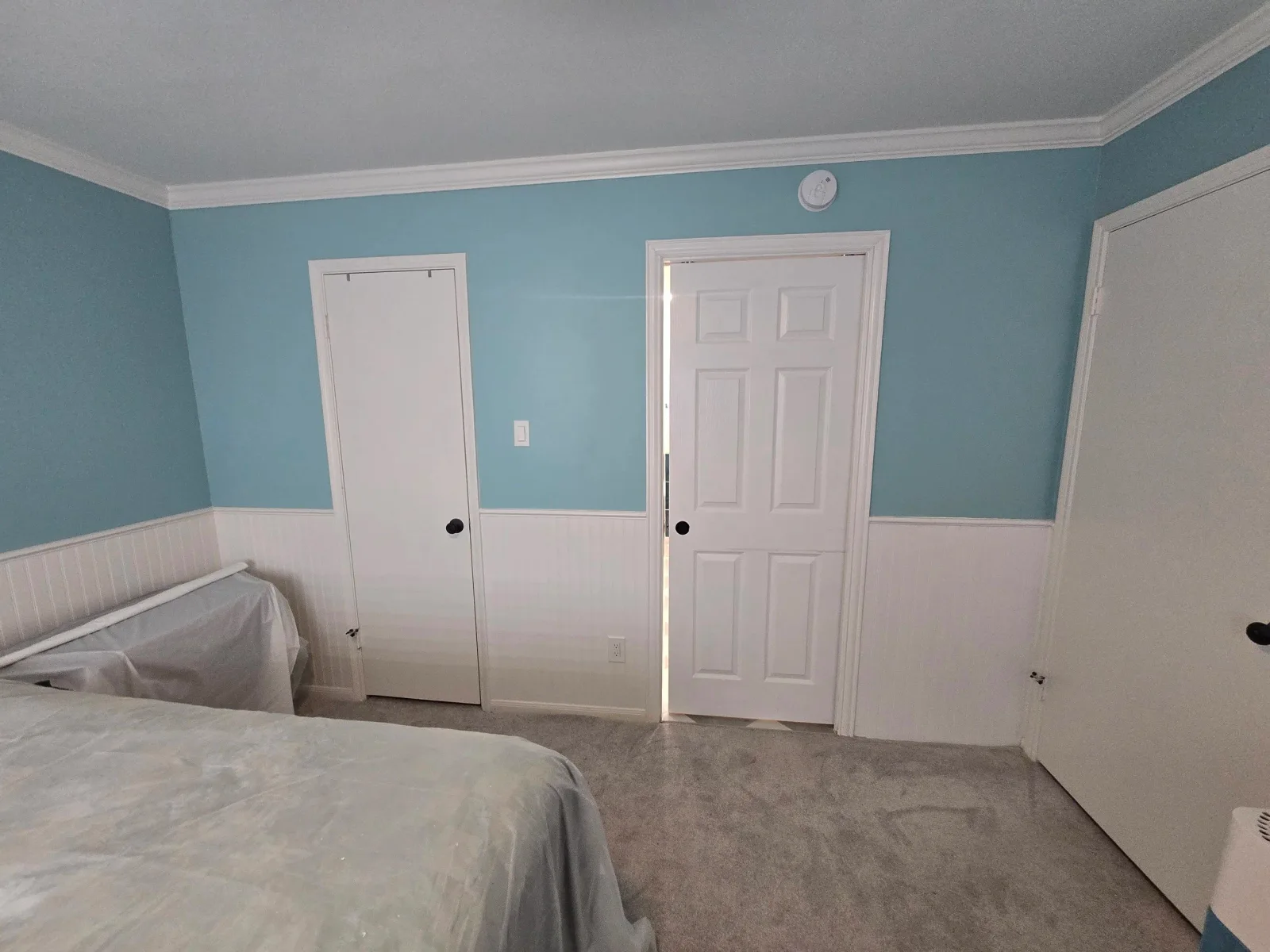Aqua blue bedroom freshly painted walls west houston TX interior painting