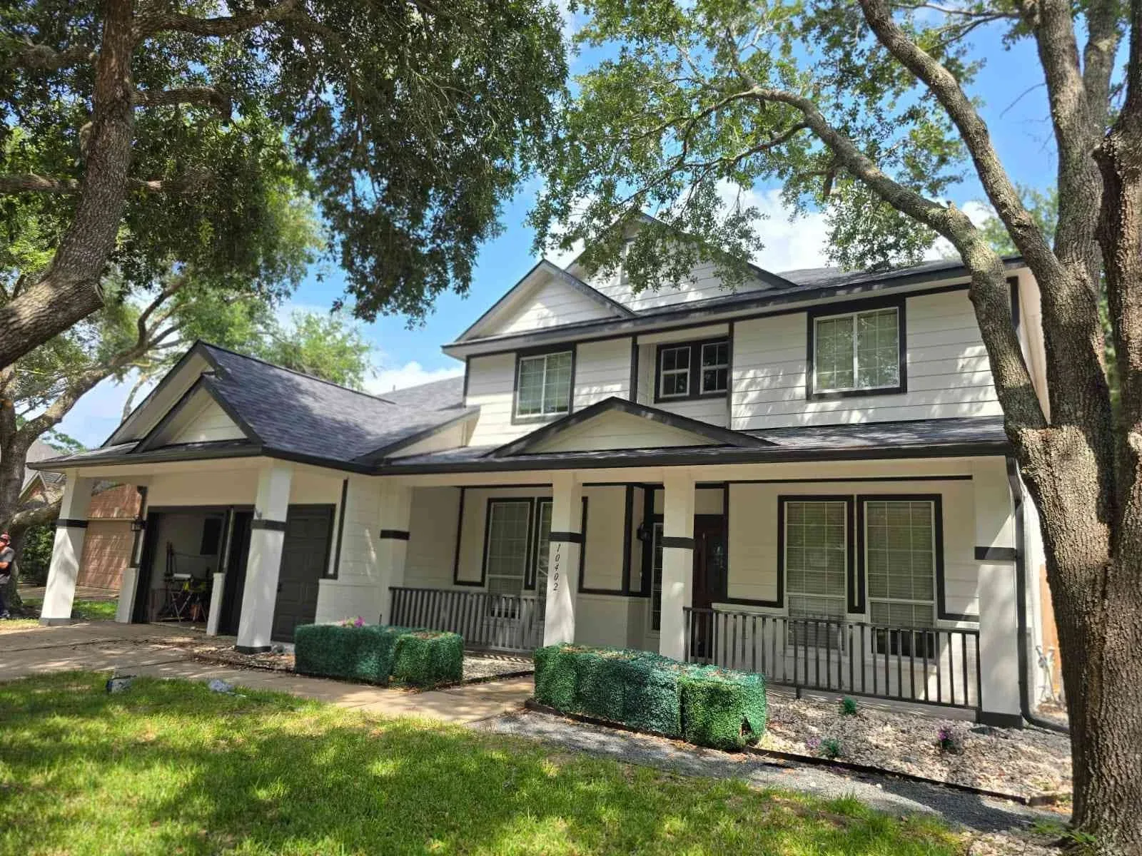 Brick exterior house painting in Sugar Land, TX by The Proud Paintbrush