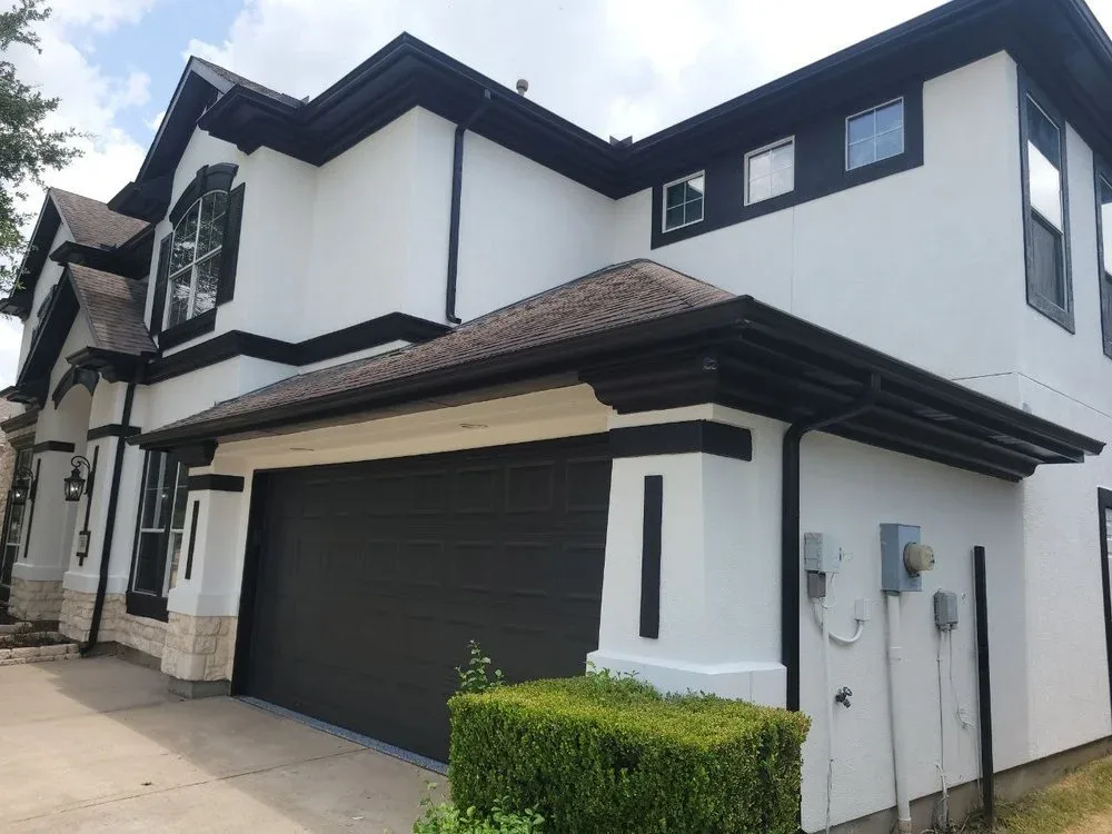 Bright stucco home painting finish in Sugar Land by The Proud Paintbrush