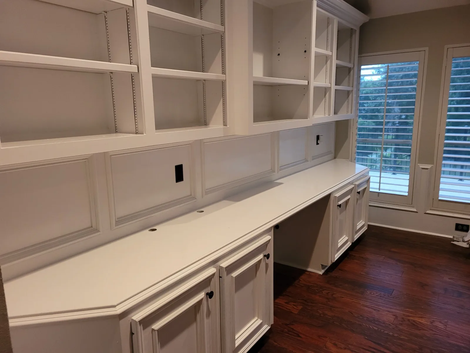 Freshly painted built-in cabinets with a smooth custom finish in Sugar Land, Texas
