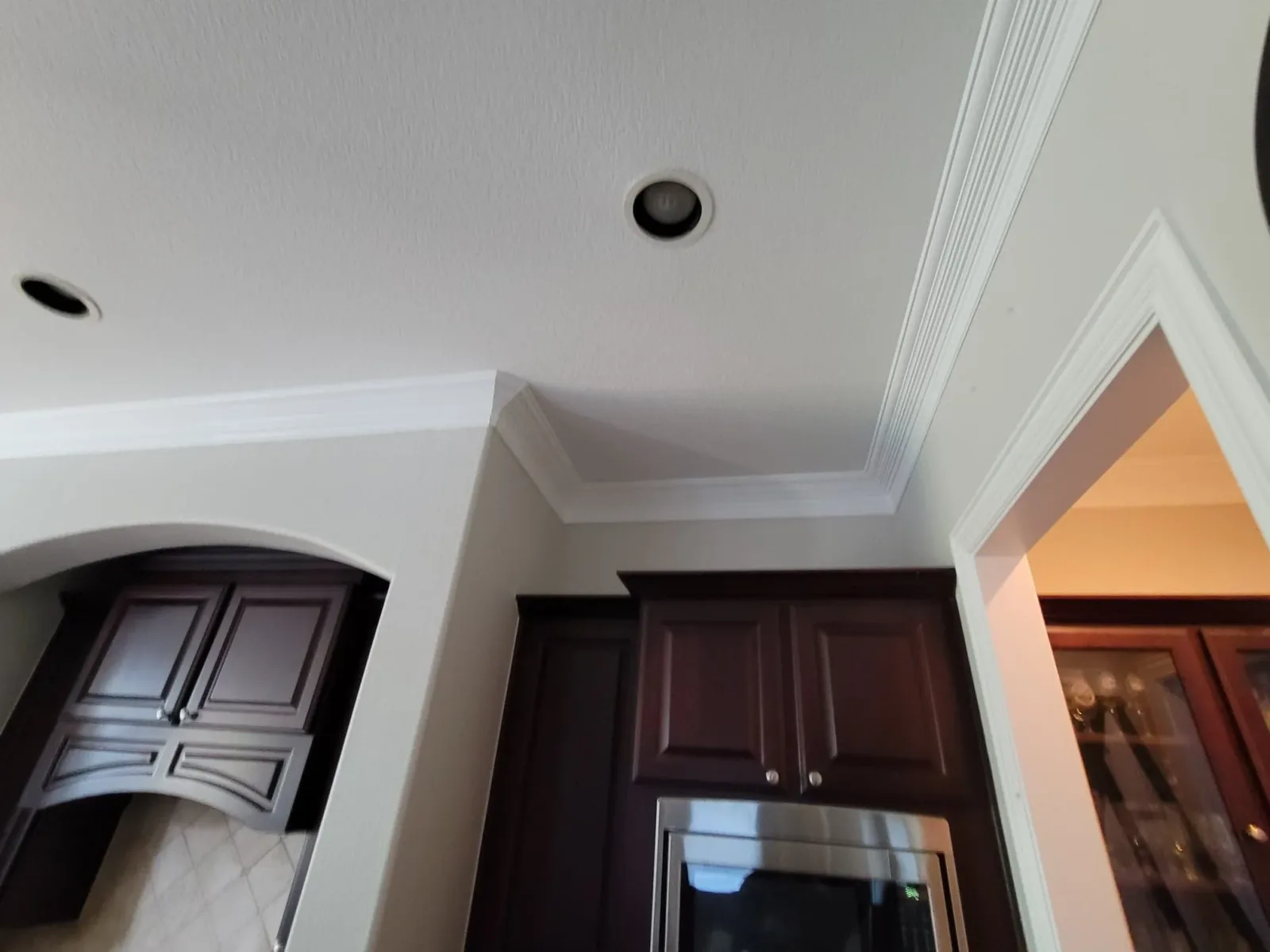 Cream Ceiling Crown Molding Paint in Sugar Land, TX by The Proud Paintbrush