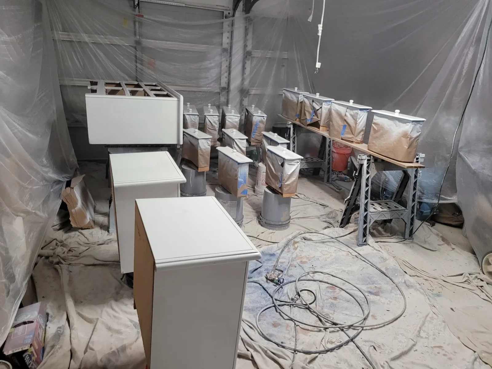 kitchen doors and drawers being airless sprayed