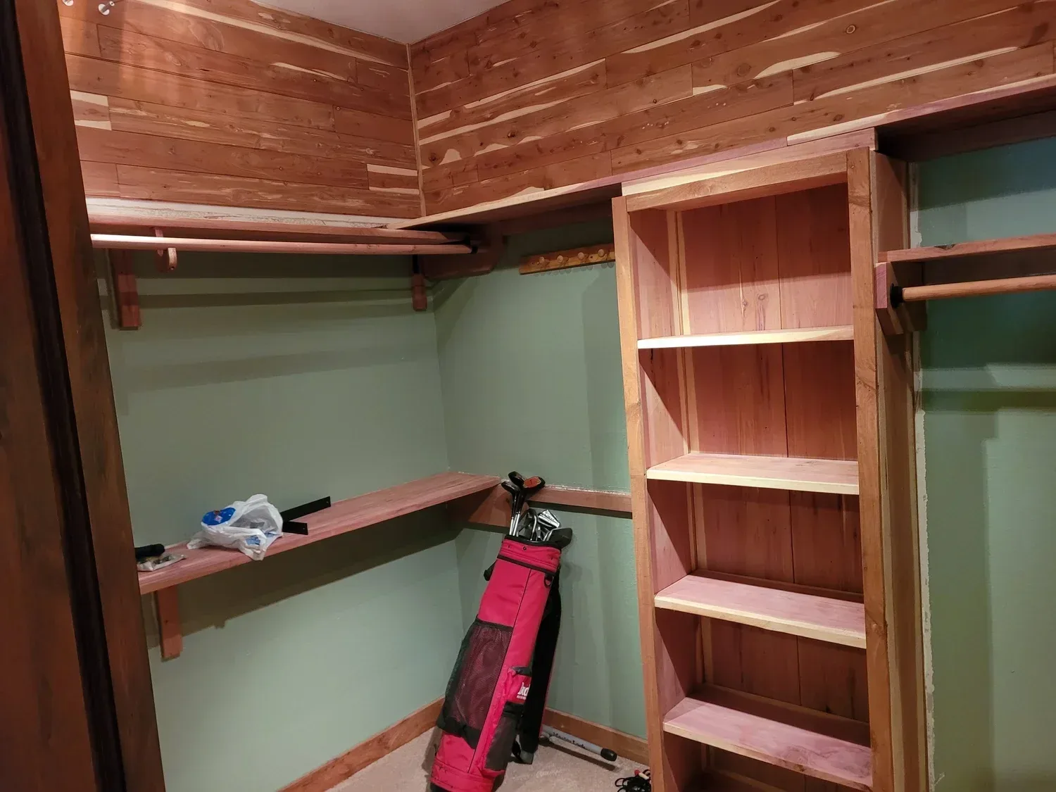 Finish Carpentry Cedar Closet Shelving Stained in Sugar Land, TX by The Proud Paintbrush