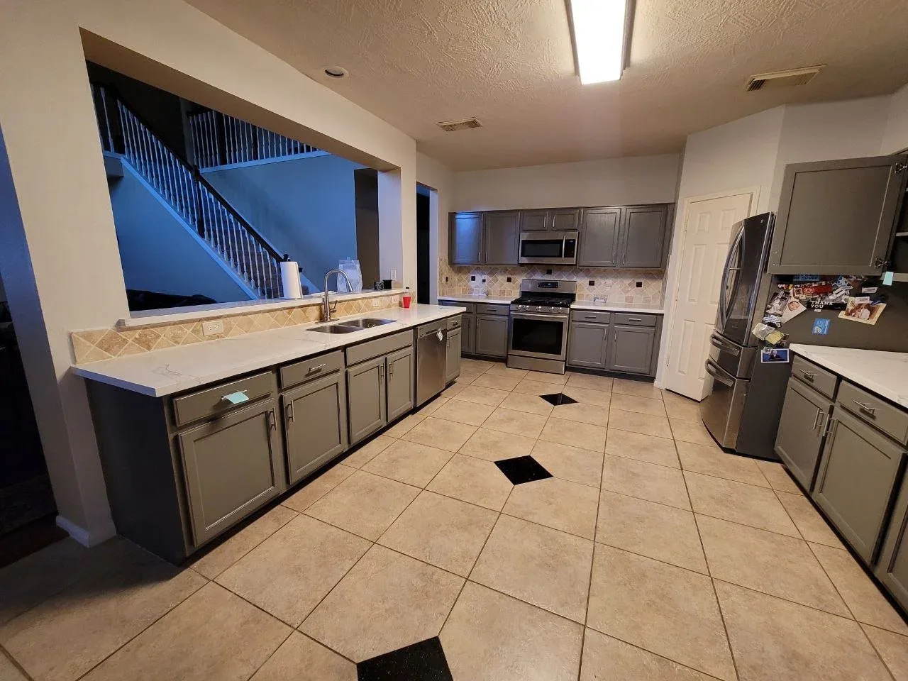 Gray Kitchen Cabinet Repaint in Rosenberg, TX by The Proud Paintbrush
