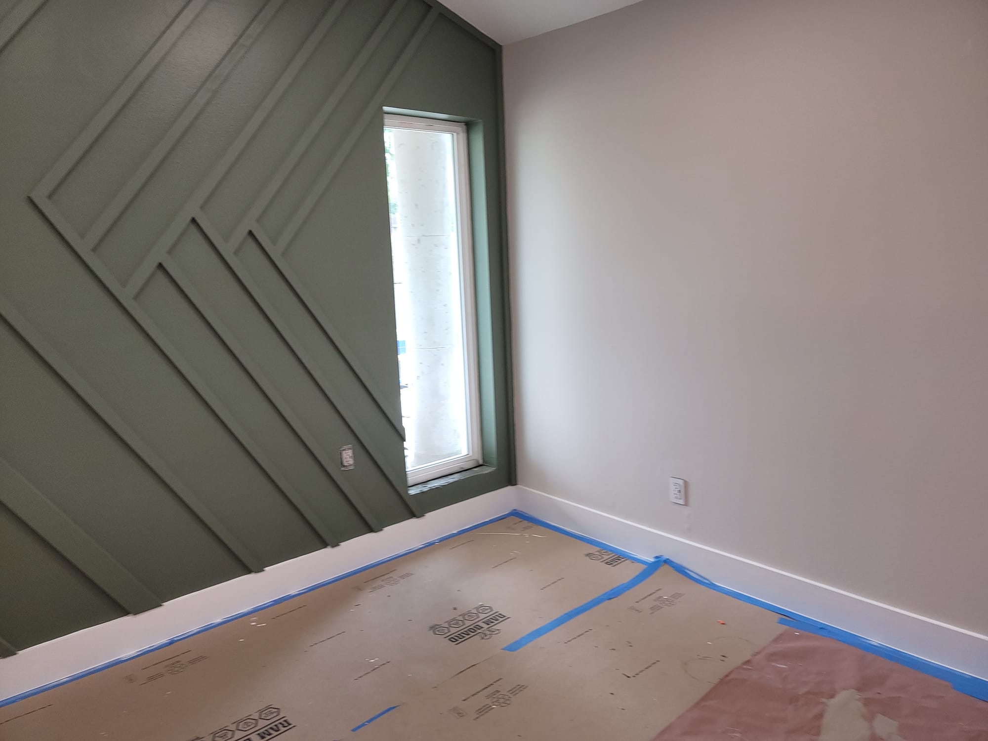 Green Board Batten Accent Wall in Katy, TX by The Proud Paintbrush
