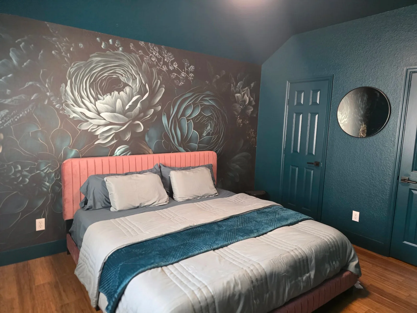 Interior bedroom painting with custom floral feature wall completed by The Proud Paintbrush in Sugar Land, Texas