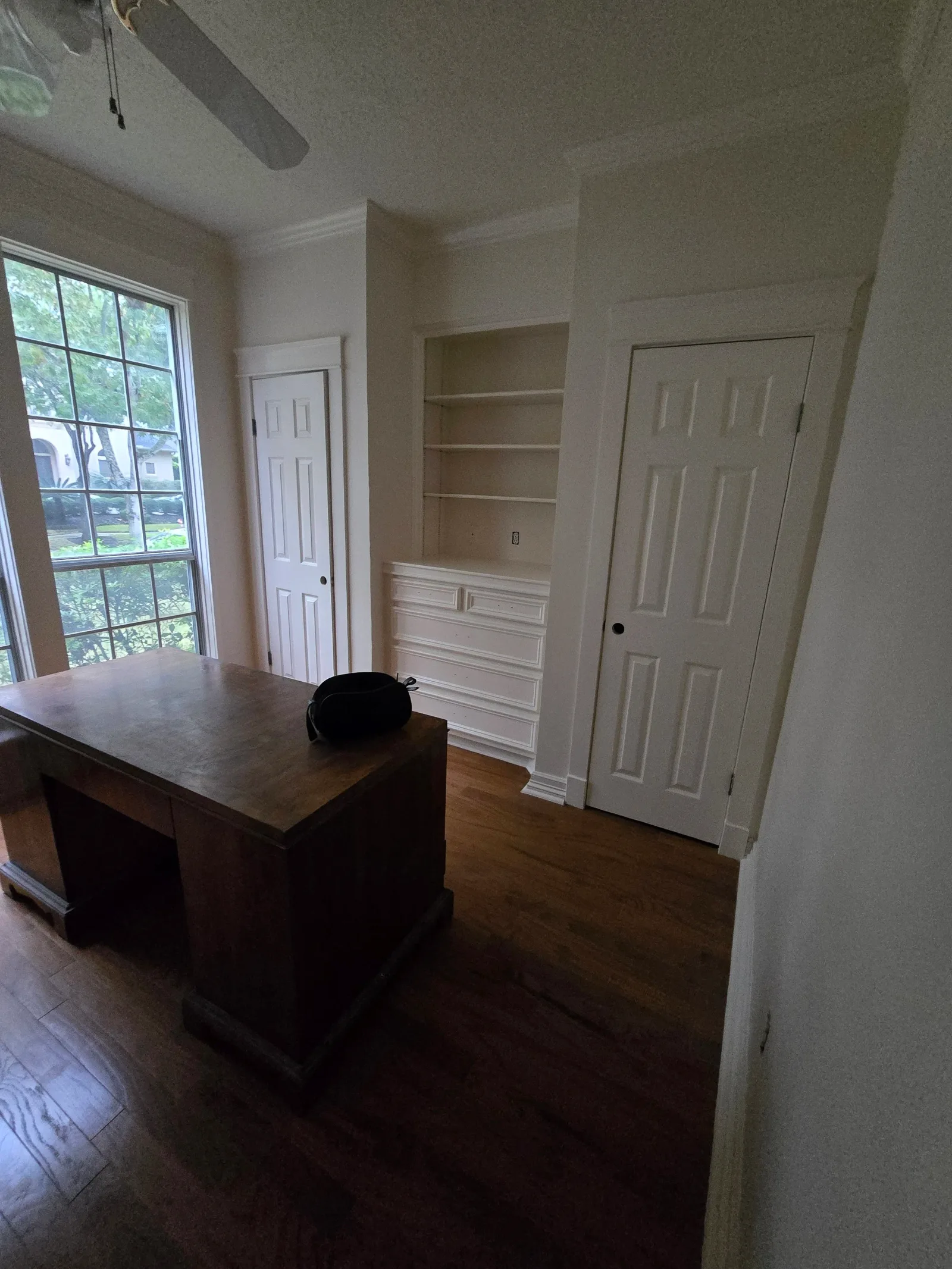 Newly painted modern bedroom interior in Missouri City TX with open layout