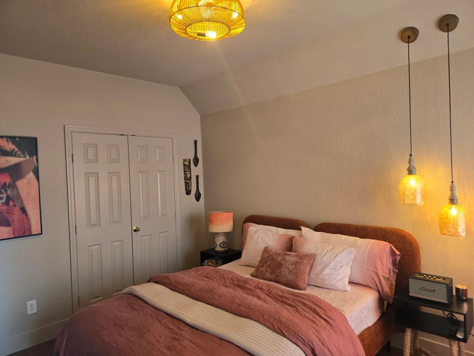 Warm neutral bedroom with soft color drenching design in Missouri City, TX interior painting inspiration by The Proud Paintbrush.