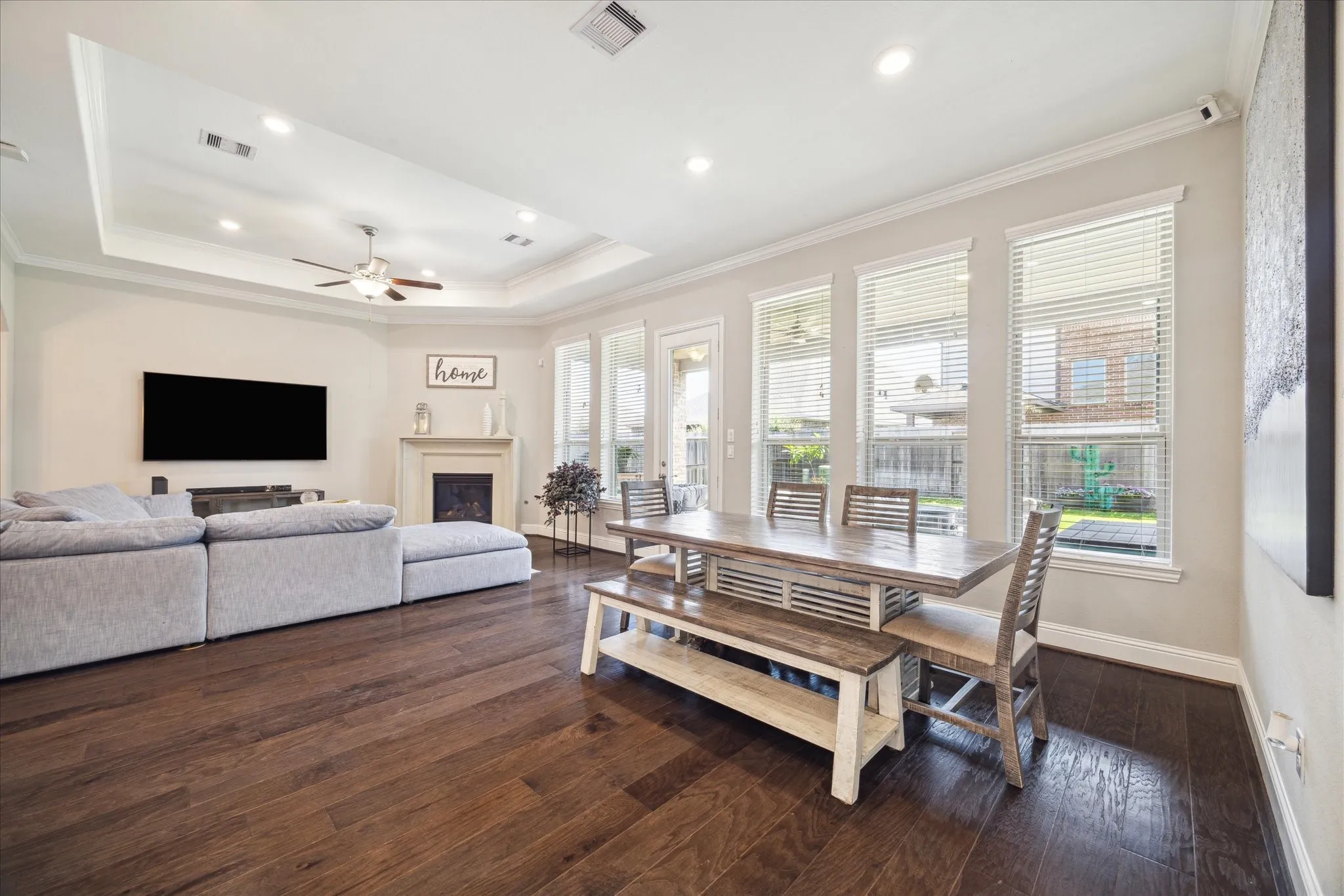Open Concept Living Dining Room in Southwest Houston, TX by The Proud Paintbrush