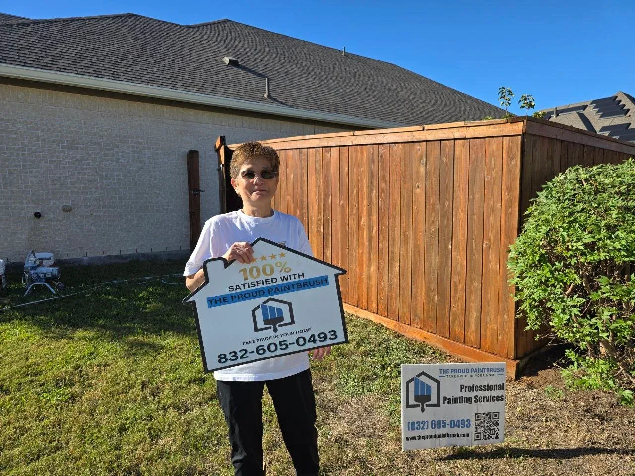 happy customer 100% satisfied with her freshly stained fence in rosenberg texas