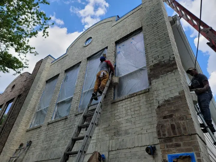 Brick exterior limewash project featuring detailed surface preparation and a breathable finish designed for long-term durability.