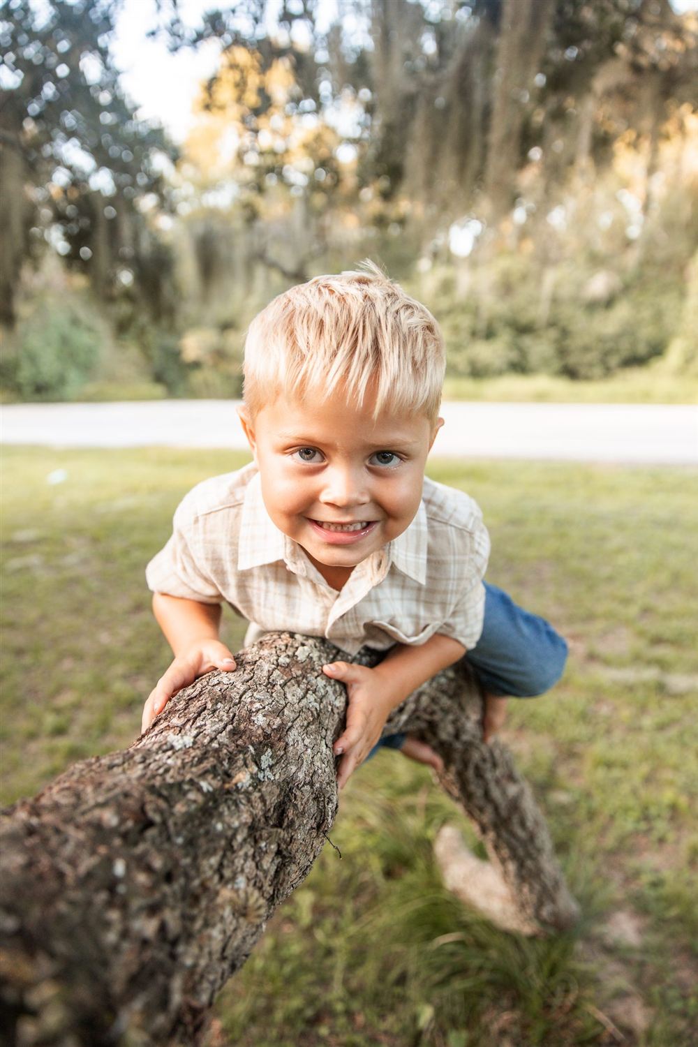 Petkau son by a live oak — family-owned painters in Sugar Land, TX