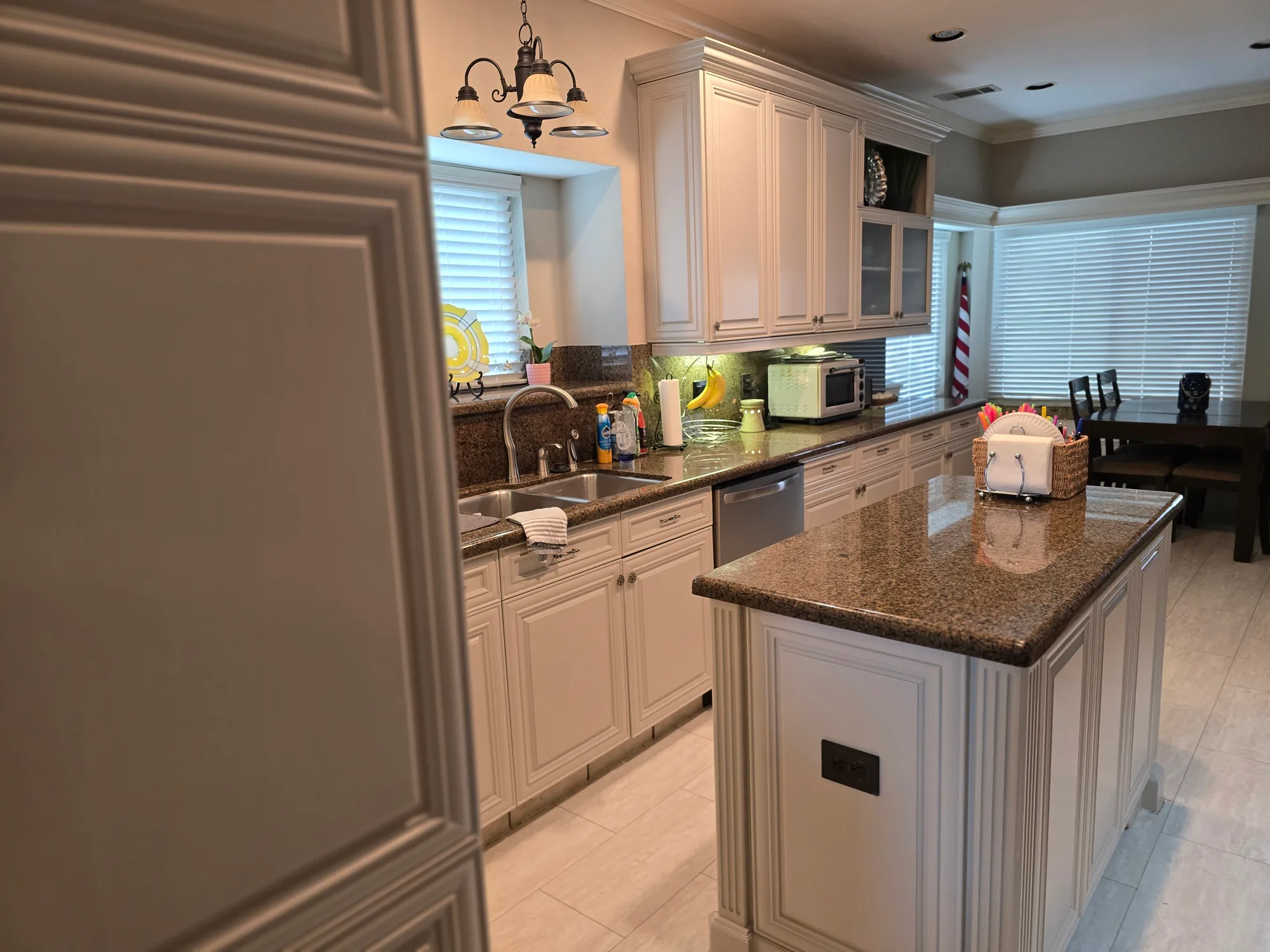 Refinished kitchen cabinets in Revere Pewter, Memorial Parkway, Katy TX